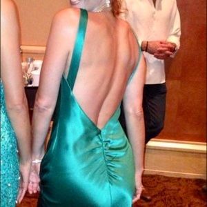 Green satiny backless gown